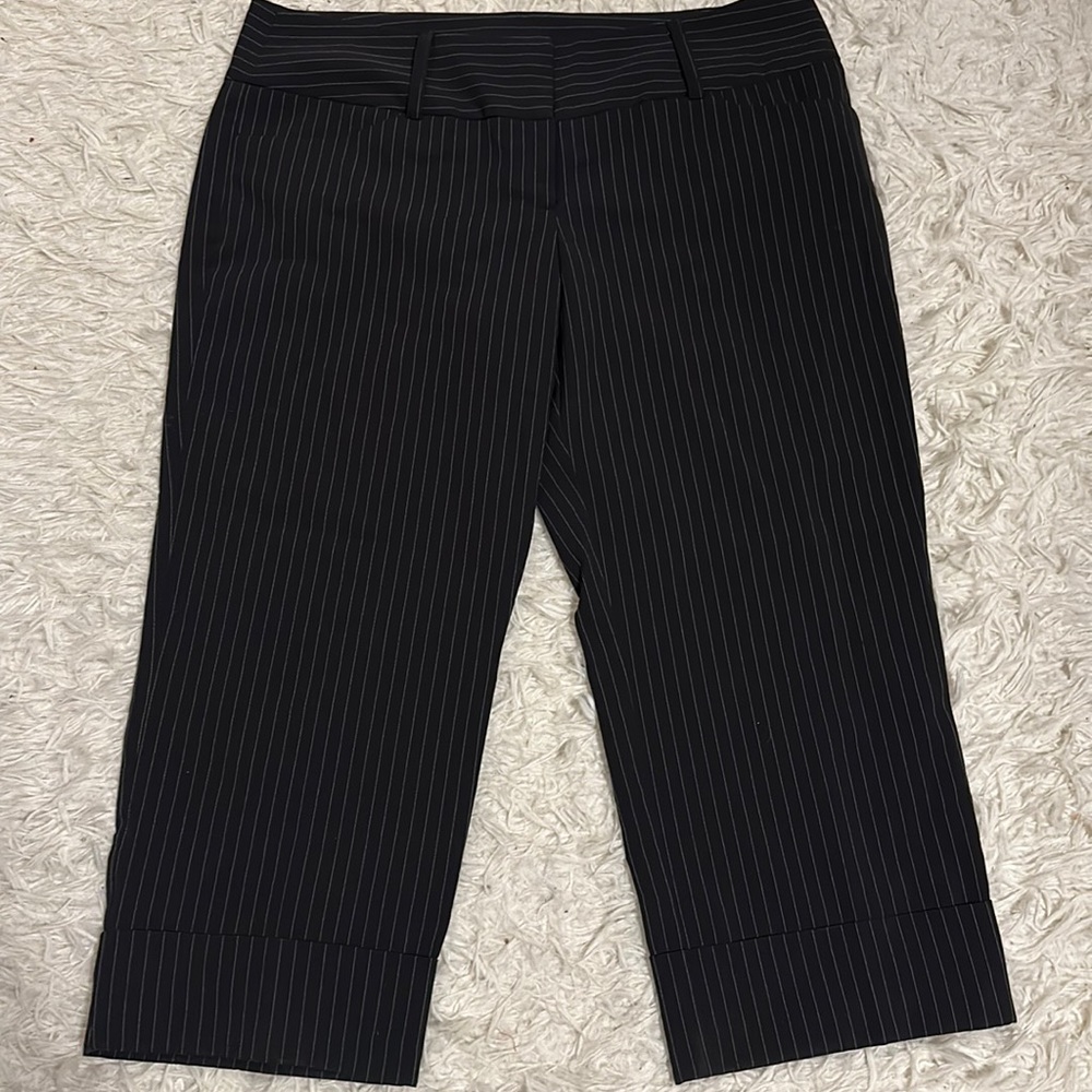 Tracy Evans woman’s dress Pants.  Size 13, black with thin threaded pinstripe.